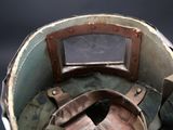 a close up of a helmet on a black background