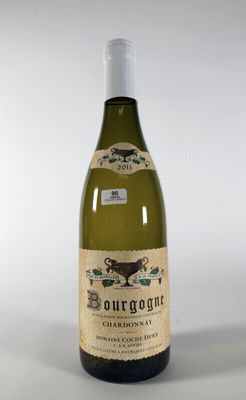 a bottle of wine that is sitting on a table
