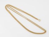 a gold chain necklace with a clasp on a white background
