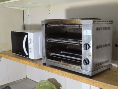 an image of a toaster oven and microwave on a kitchen counter