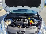 a car with its hood open with the hood open