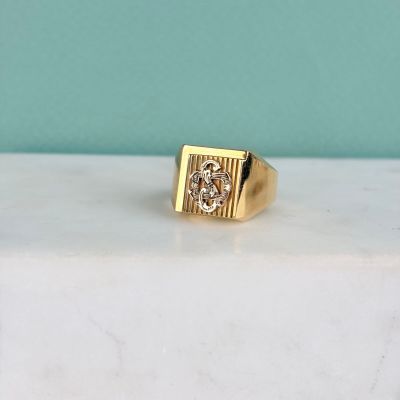 gold plated ring with cubic zirconia in center