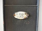 a metal box that has a sign on it
