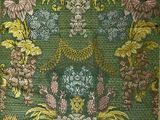 une image représentant un papier peint à motifs floraux verts et jaunes