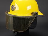 yellow hard hat with clear vise and yellow helmet cap