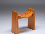 an image of a wooden bench on a grey background
