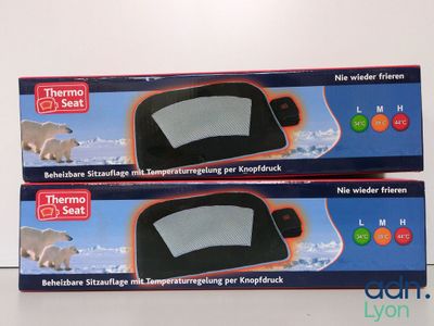 two boxes of thermo thermo seat on the table