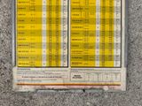 a picture of a bus timetable on the side of the road