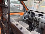 a van that has a bunch of seats in it