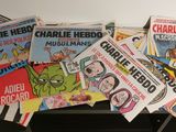 a lot of comic books on a black table