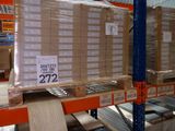 a large stack of boxes on a shelf in a warehouse