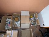 many boxes of items that are sitting on the floor