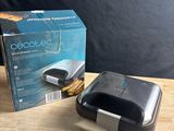 a box and a charger sitting on a table