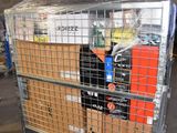 a metal cart with many items in it in a warehouse
