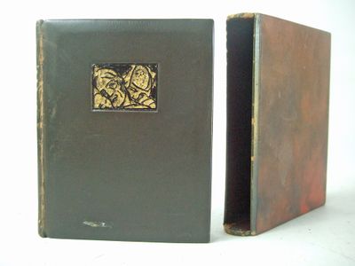 two books that are sitting side by side on a table