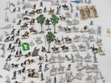 a lot of toy figurines that are on the table