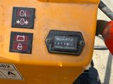 a close up of a yellow machine with red and black buttons