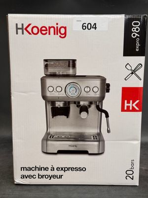 boxed box of a coffee machine sitting on top of a table