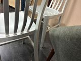 two chairs sitting next to each other in a room