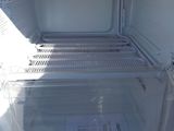 an open refrigerator with a lot of food inside of it