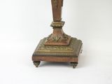 a small table with a clock on top of it