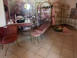a picture of a living room with a lot of furniture in it