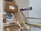 a metal shelf that has a bunch of items on it