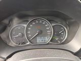 a close up of a car dashboard with a speedometer