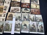 a lot of old postcards on a black table