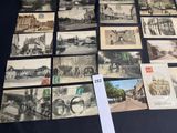 many old postcards that are on the table