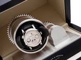 black and white watch in a black box with a white background