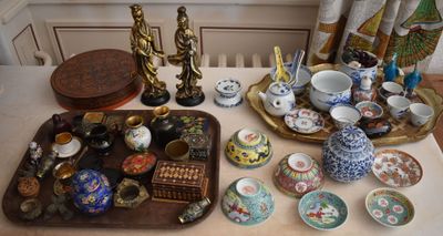 a table with a tray and a tray with a lot of items on it