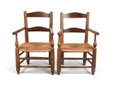 pair of early 20th century oak ladderback chairs