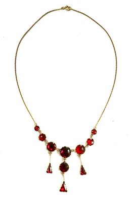 Collier en or jaune à pendeloques serti de grenats taille ro…