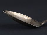 a spoon that is sitting on top of a table