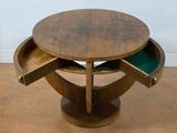 a wooden table with a drawer on top of it