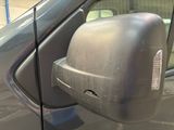 a side view mirror on the side of a car