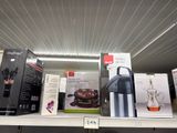 a shelf that has a bunch of different items on it