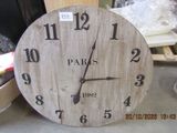 a clock that is sitting on a table in a room