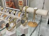 many watches on display in a glass case