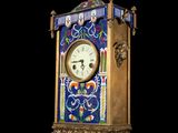 a clock that is sitting on top of a table