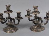pair of silver plated candlesticks with birds and flowers
