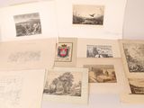 a lot of old books with pictures on them on a table