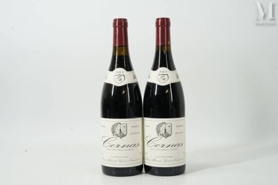 deux bouteilles de vin posées l'une à côté de l'autre sur une table
