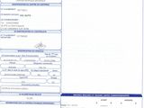 un gros plan d'un document sur lequel figure la photo d'une voiture