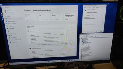a computer monitor that is sitting on a desk