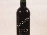 a bottle of wine that is sitting on a table