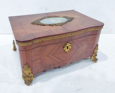 an image of a wooden box with a mirror on top of it