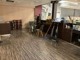 an image of a room that has a lot of furniture in it