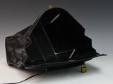 a black purse that is open on a white surface